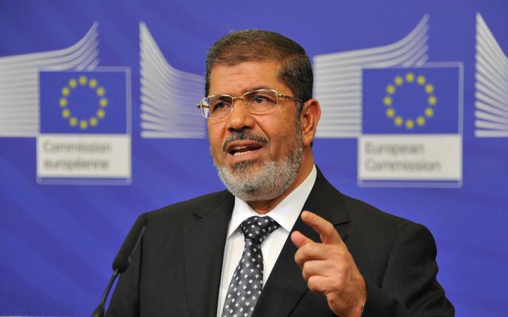 Former Egyptian President Mohamed Morsi speaking in Brussels in 2012