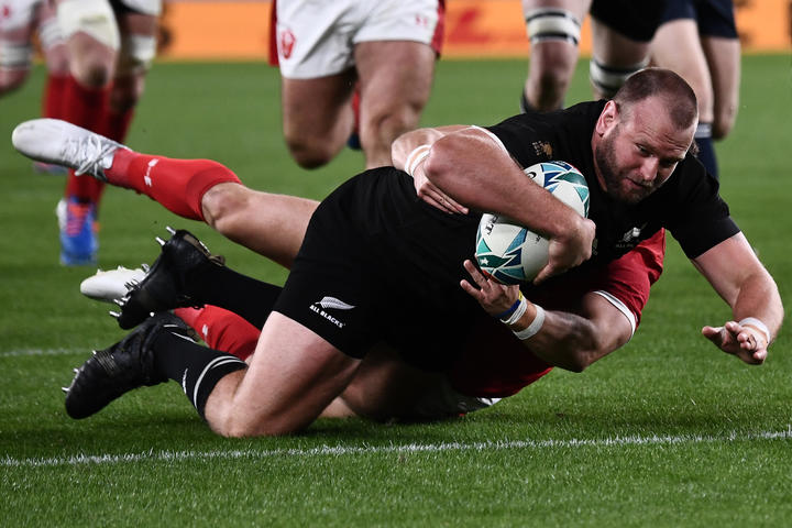 New Zealand's prop Joe Moody scores a try during the Japan 2019 Rugby World Cup bronze final match between New Zealand and Wales at the Tokyo Stadium in Tokyo on November 1, 2019. (Photo by Anne-Christine POUJOULAT / AFP)