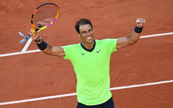 Spain's Rafael Nadal celebrates after winning against Italy's Jannik Sinner during their men's singles fourth round tennis match at the French Open tennis tournament in Paris on June 7, 2021. 
