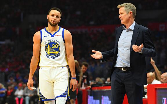 Golden State Warriors Guard Stephen Curry (30) and head coach Steve Kerr 