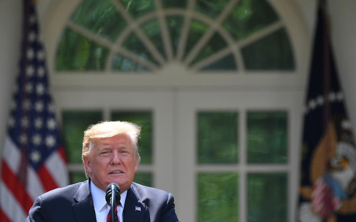 Amid criticism, Trump defends Mexico deal avoiding tariffs Amid criticism, Trump defends Mexico deal avoiding tariffs
