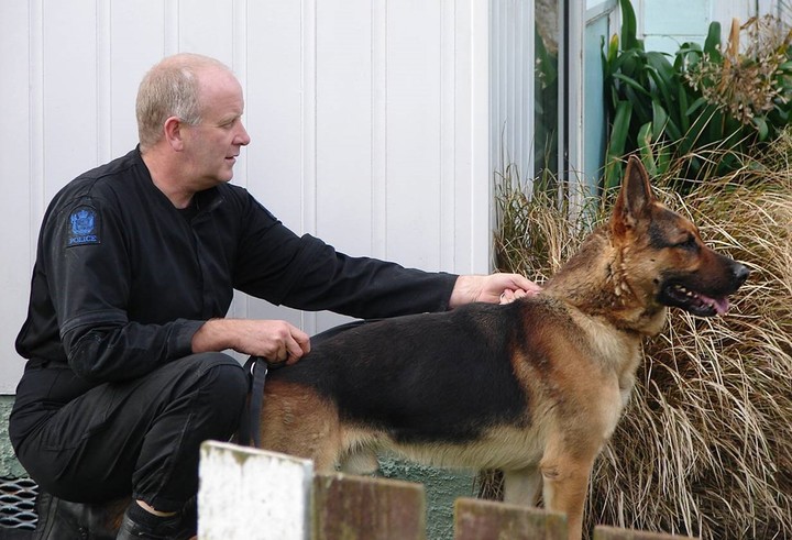 Senior Constable Bruce Lamb and his dog Gage.
