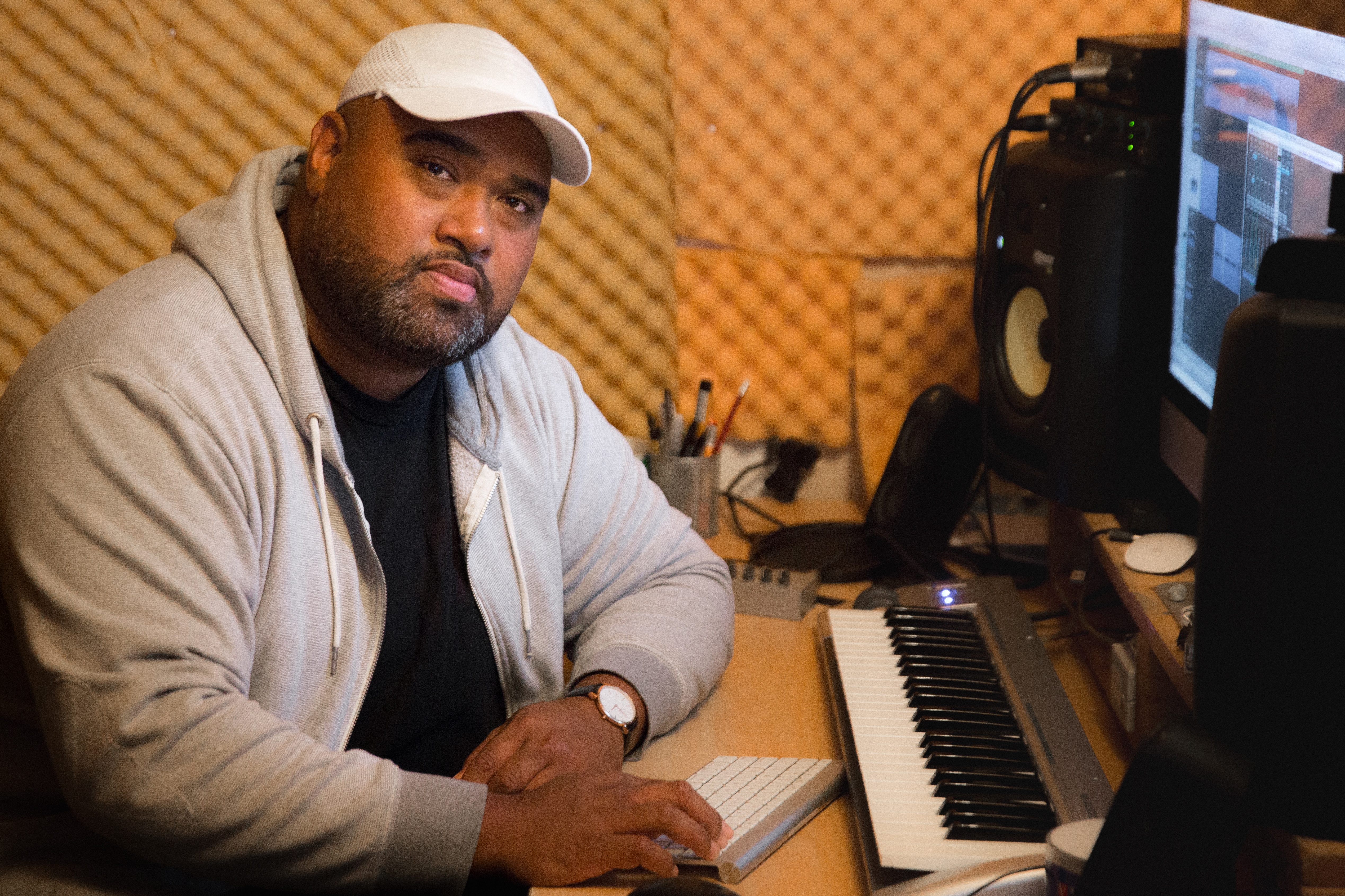 Rizvan Tu’itahi sitting in his recording studio