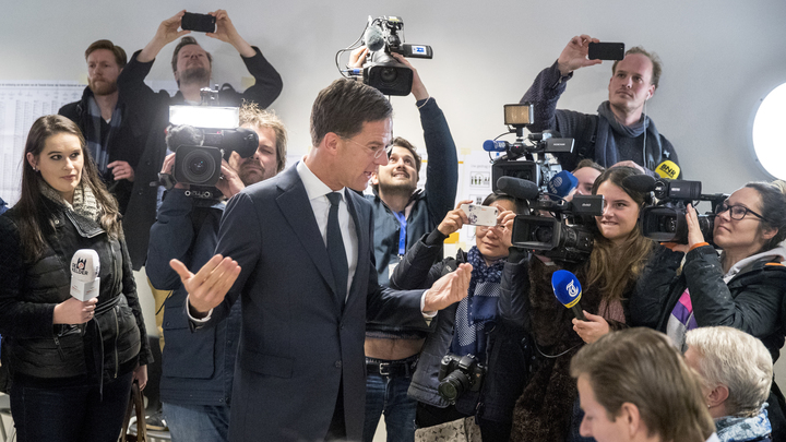 Prime Minister Mark Rutte speaks to media after casting his ballot.