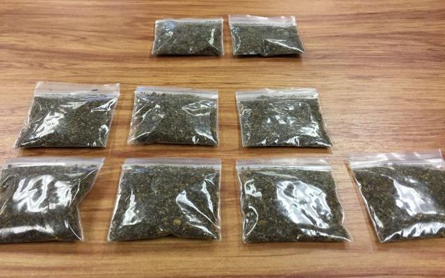 Bags of synthetic cannabis were found in the roof cavity of one house, police said.
