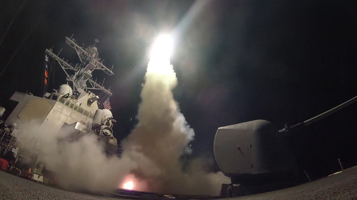 A Tomahawk missile is launched from the USS Ross during a military strike on a Syrian airbase.