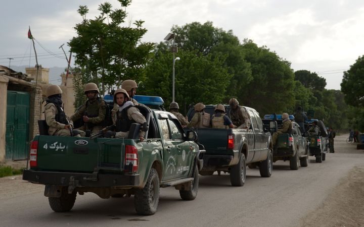 At least eight Afghan soldiers have been killed and 11 wounded during an ongoing Taliban attack on their base in northern Afghanistan, the defence ministry said.