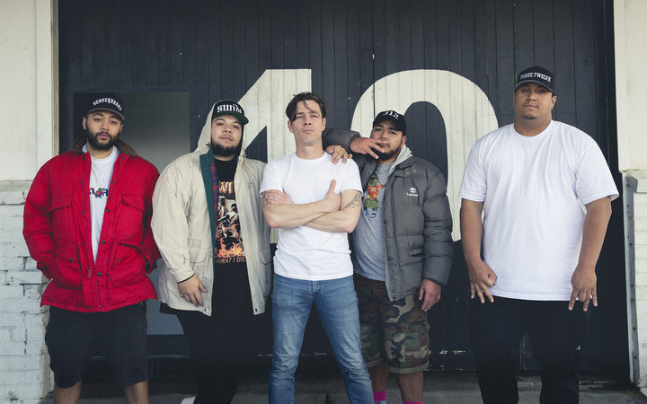 SWIDT outside their Onehunga studio with Music 101 host Alex Behan