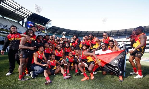 Papua New Guinea celebrate winning the 2017 AFL International Cup.