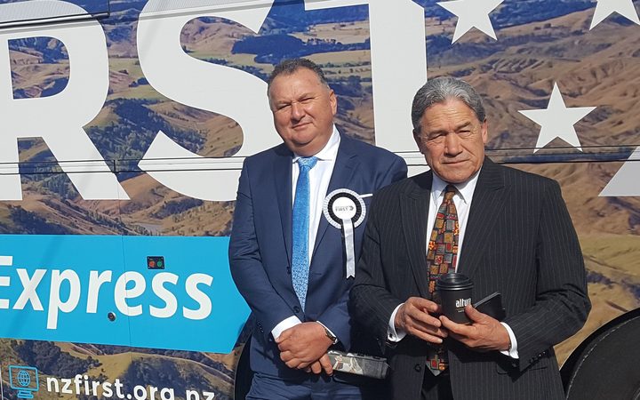 Winston Peters and Shane Jones outside their party's bus. 