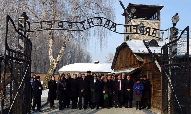 Members of the Knesset enter the main gate at the Auschwitz concententration camp in Poland on Holocaust Day.