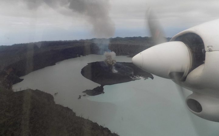 An aerial image of the smoking volcano in the centre of Ambae, Vanuatu, that's forced the evacuation of some 5,000 people.