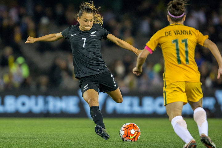 Ali Riley runs with the ball during during the Australia Matildas vs New Zealand Football Ferns womens football international at Etihad stadium Melbourne Australia on the the 7th of June 2016