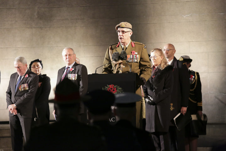 Chief of Defence Force Lt-Gen Tim Keating addresses the crowd at the national memorial in Wellington.  
