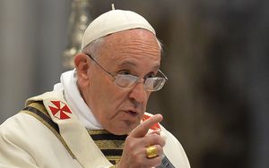 Pope Francis speaks during Mass on Holy Thursday at St Peter's Basilica.