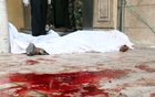 A body outside a field hospital in Aleppo.