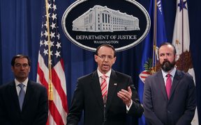 Deputy Attorney General Rod Rosenstein (C), Acting Principal Associate Deputy Attorney General Edward O'Callaghan (R) and Assistant Attorney General John Demers holds a news conference at the Department of Justice in Washington, DC. 
