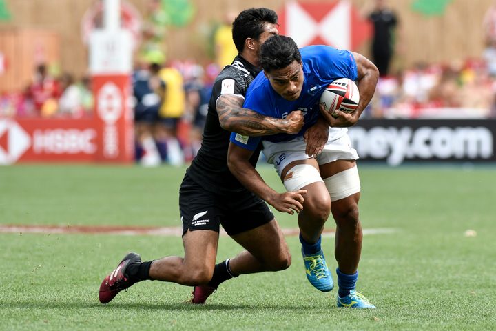 Gordon Langkilde is tackled during a World Series match against New Zealand.