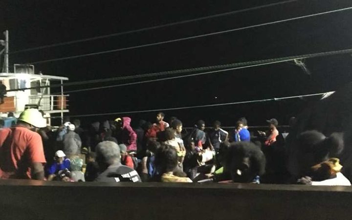 Ambaeans being evacuated on the deck of a ship bound for Santo.