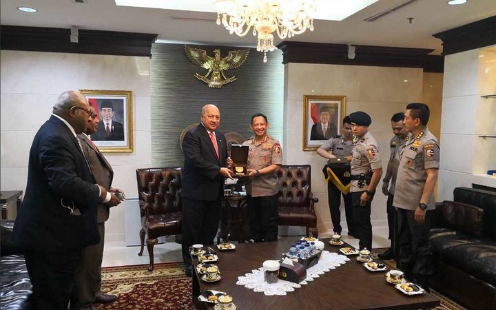 Fiji's defence minister Ratu Inoke Kubuabola (centre left) with Indonesia's Chief of Police General Tito Karnavan