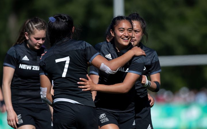 Mahina Paul celebrates with her teammates after scoring the winning try in the Rugby Sevens Women's Gold Medal Match against France at 2018 Youth Olympics.