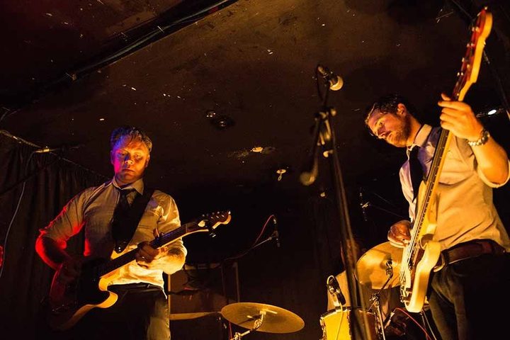 Delaney Davidson and Ben Woolley performing Bob Dylan's 'This Wheel's On Fire' live at the Wine Cellar
