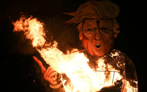 An effigy of Donald Trump is burned by the Edenbridge Bonfire Society in the UK.