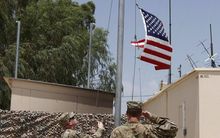 The US flag is lowered in Laghman province in 2012.