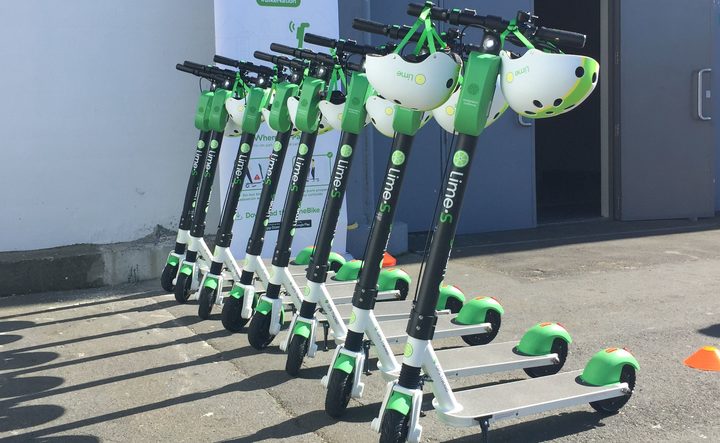 Rack 'em up: Lime scooters for hire outside the TraffiNZ conference on Wellington's waterfront this week - as part of a charm offensive in the capital. 