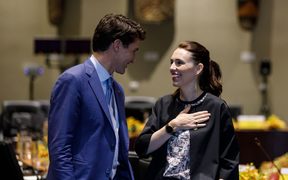 Canadian prime minister Justin Trudeau and Jacinda Ardern share a conversation at the APEC summit in Papua New Guinea. 18 November 2018