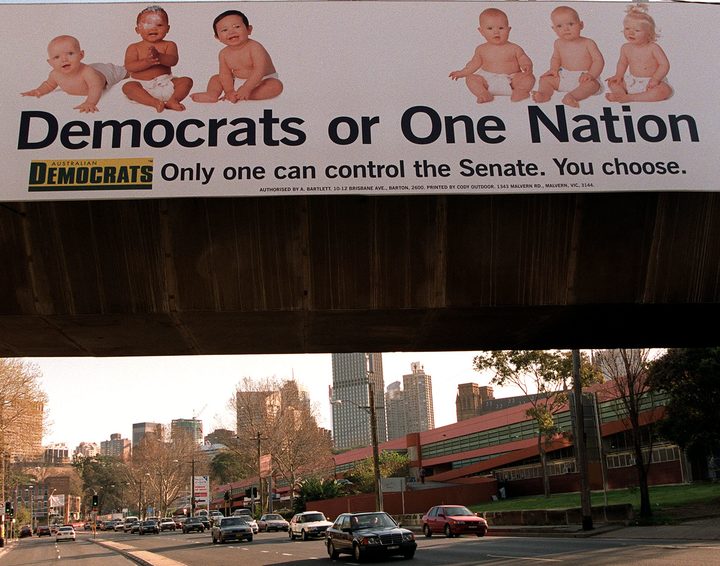 An election billboard informs Sydney drivers 03 September that either the moderate Democrats or Pauline Hanson's far-right One Nation Party could control the balance of power in the Australian Senate after the Federal elections 03 October.