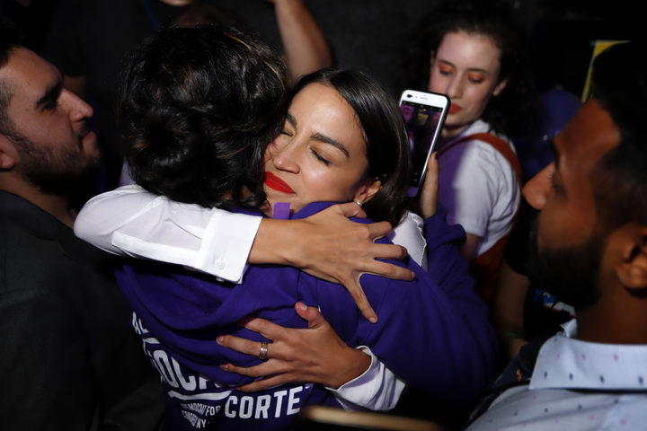 Alexandria Ocasio-Cortez hugs a supporter during her victory celebration at La Boom night club in Queens on November 6, 2018 in New York City. With her win against Republican Anthony Pappas, Ocasio-Cortez became the youngest woman elected to Congress.  