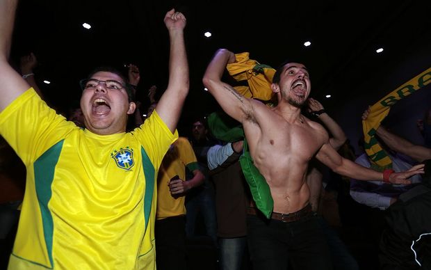 Brazilians Pablo Gomez and Mario Coelho celebrate their team's second goal.