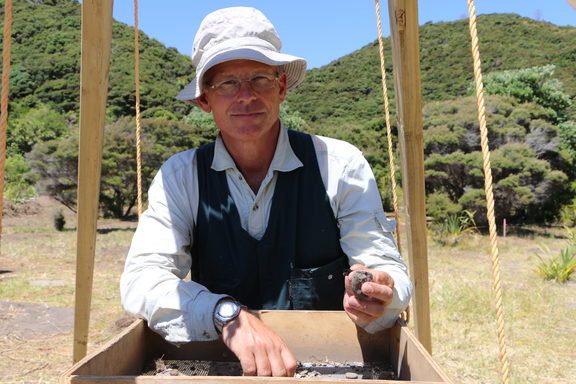 Lead archaeologist Dr James Robinson at the dig site at Mangahawea Bay on Moturua Island.