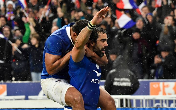 France rugby player Yoann Huget  celebrates his try.