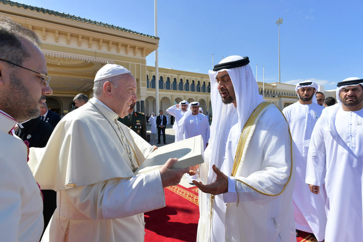 Pope Francis gifts Abu Dhabi's Crown Prince Mohammed bin Zayed al-Nahyan a copy of the Human Fraternity document ahead of boarding his plane on February 5, 2019.