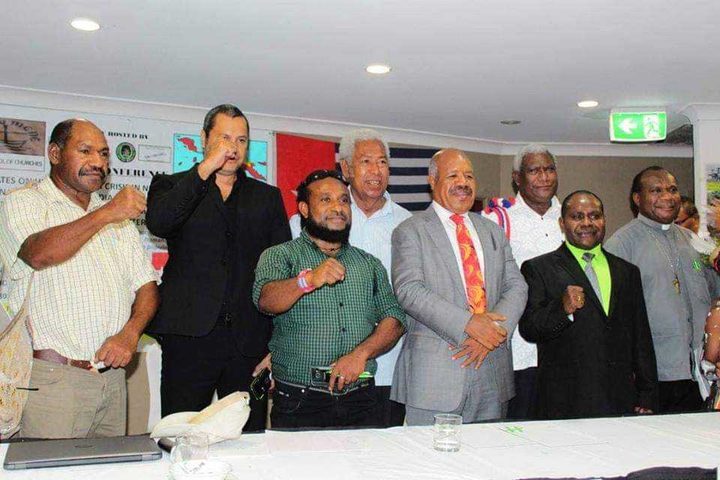 OPM Free West Papua Movement members alongside two PNG MPs at a press conference in Port Moresby, February 2019.