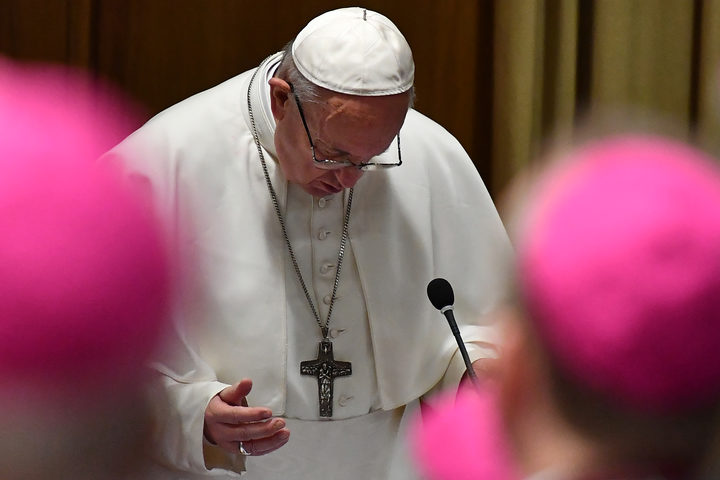 Pope Francis prays during the opening of a global child protection summit at the Vatican on 21 February 2019.