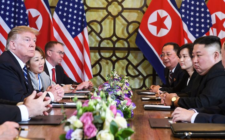 US President Donald Trump (L) and North Korea's leader Kim Jong Un (R) hold a bilateral meeting during the second US-North Korea summit at the Sofitel Legend Metropole hotel in Hanoi on February 28, 2019. 
