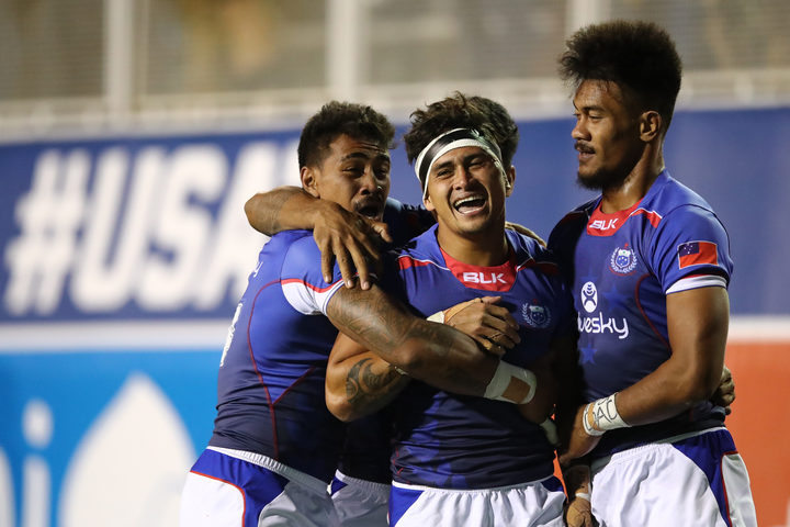 Samoa players celebrates the Cup quarter final win against Australia in Las Vegas.