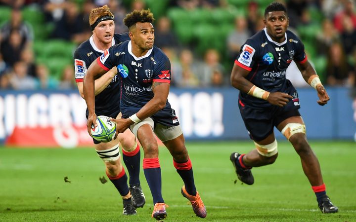 Will Genia of the Rebels passes the ball
