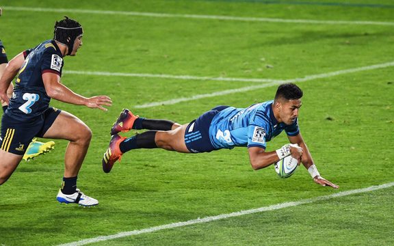 Rieko Ioane scores an early try for the Blues.
