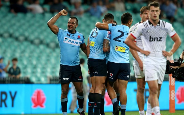 Kurtley Beale celebrates the Israel Folau try. Waratahs v Crusaders. Super Rugby round 6 match played at the Sydney Cricket Ground on  Saturday 23 March 2019. Photo Clay Cross / photosport.nz