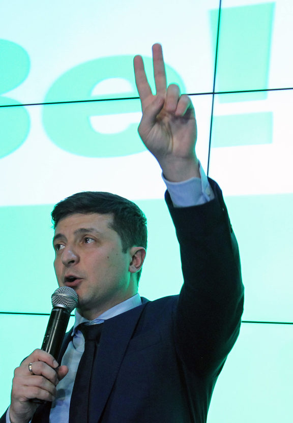 Volodymyr Zelenskiy , Ukrainian comic actor and candidate in the presidential election, reacts during his visit a campaign headquarters following a presidential election in Kiev, Ukraine, on 31 March 2019. 