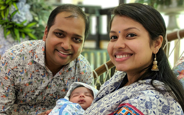 Dhanush Laxman with wife Subha Nair and son Aryan.