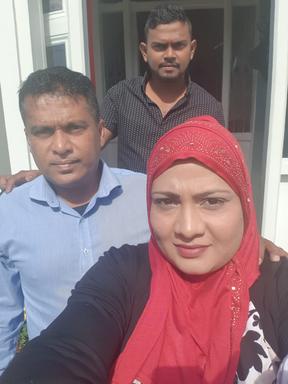 Zeenat Akif with her husband and son.