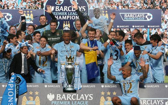 Manchester City celebrate winning the 2011-12 EPL title.