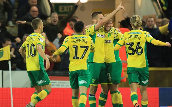 23rd October 2018, Carrow Road, Norwich,  England; EFL Championship football, Norwich City versus Aston Villa; Jordan Rhodes of Norwich Citycelebrates with team mates as he scores making 2-1 in minute 73