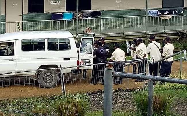 A suicidal refugee is taken to hospital by Paladin security staff.