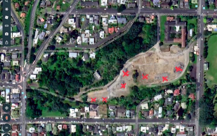 Ariel view of the former Barrett Street Hospital site in New Plymouth with piles of asbestos and lead contaminated soil marked.